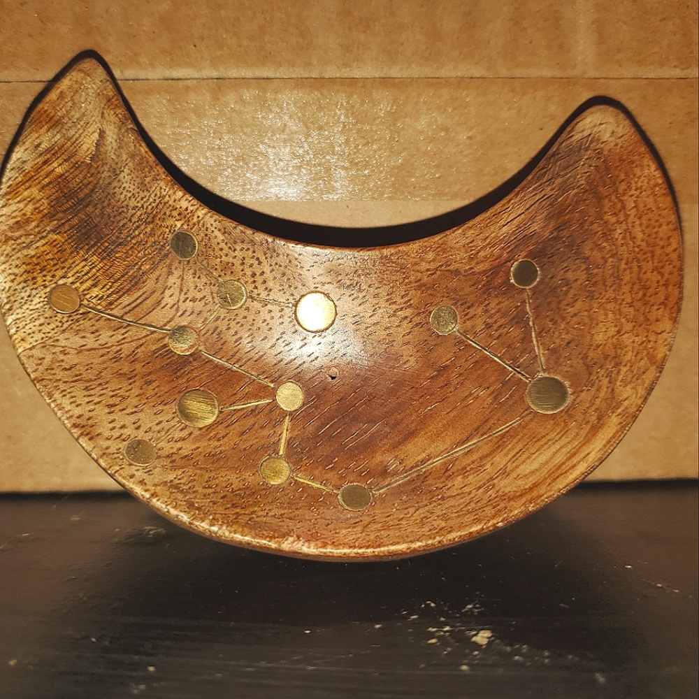 Matr Boomie Incence Stand. Crescent moon shaped, made of wood in India.